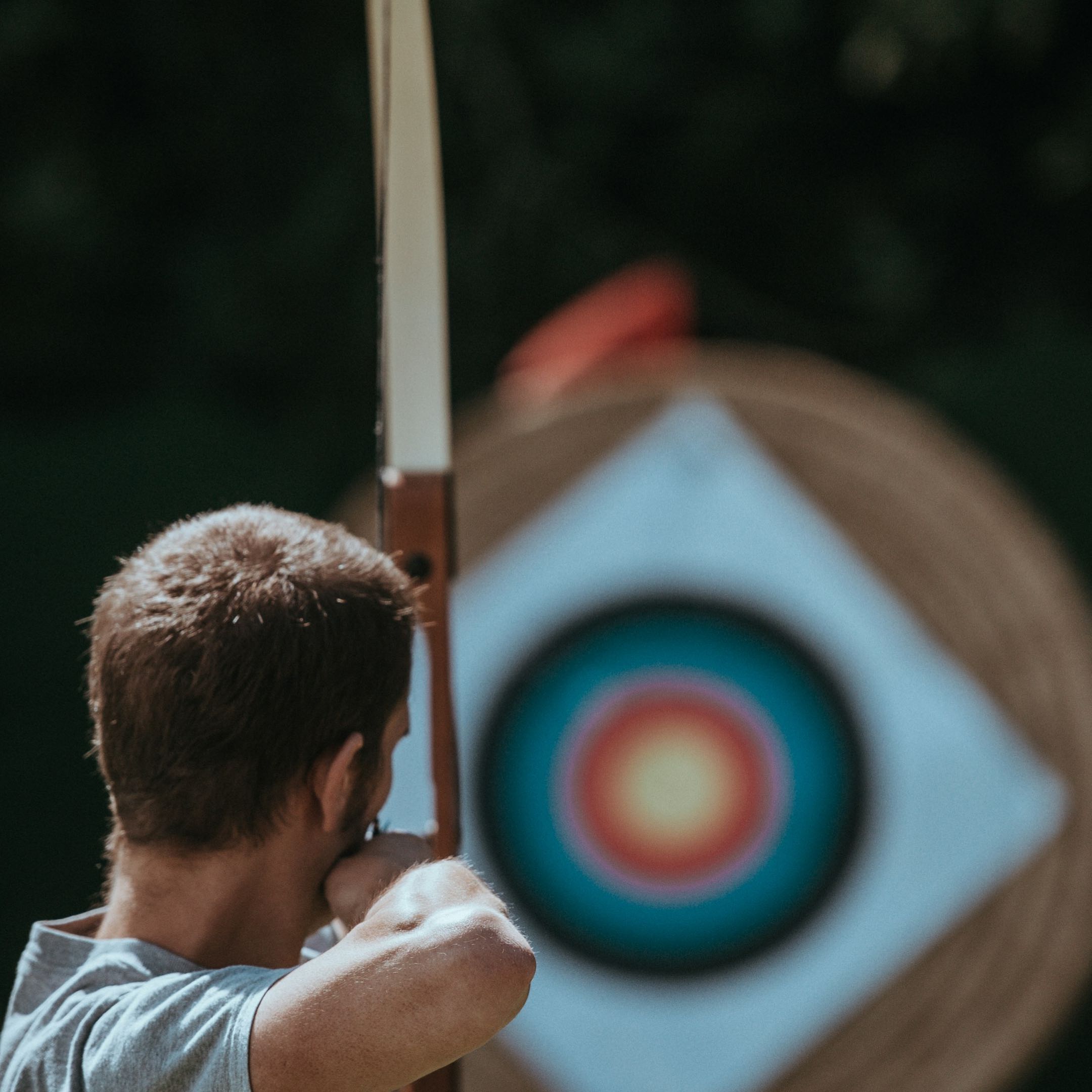 A man playing target game